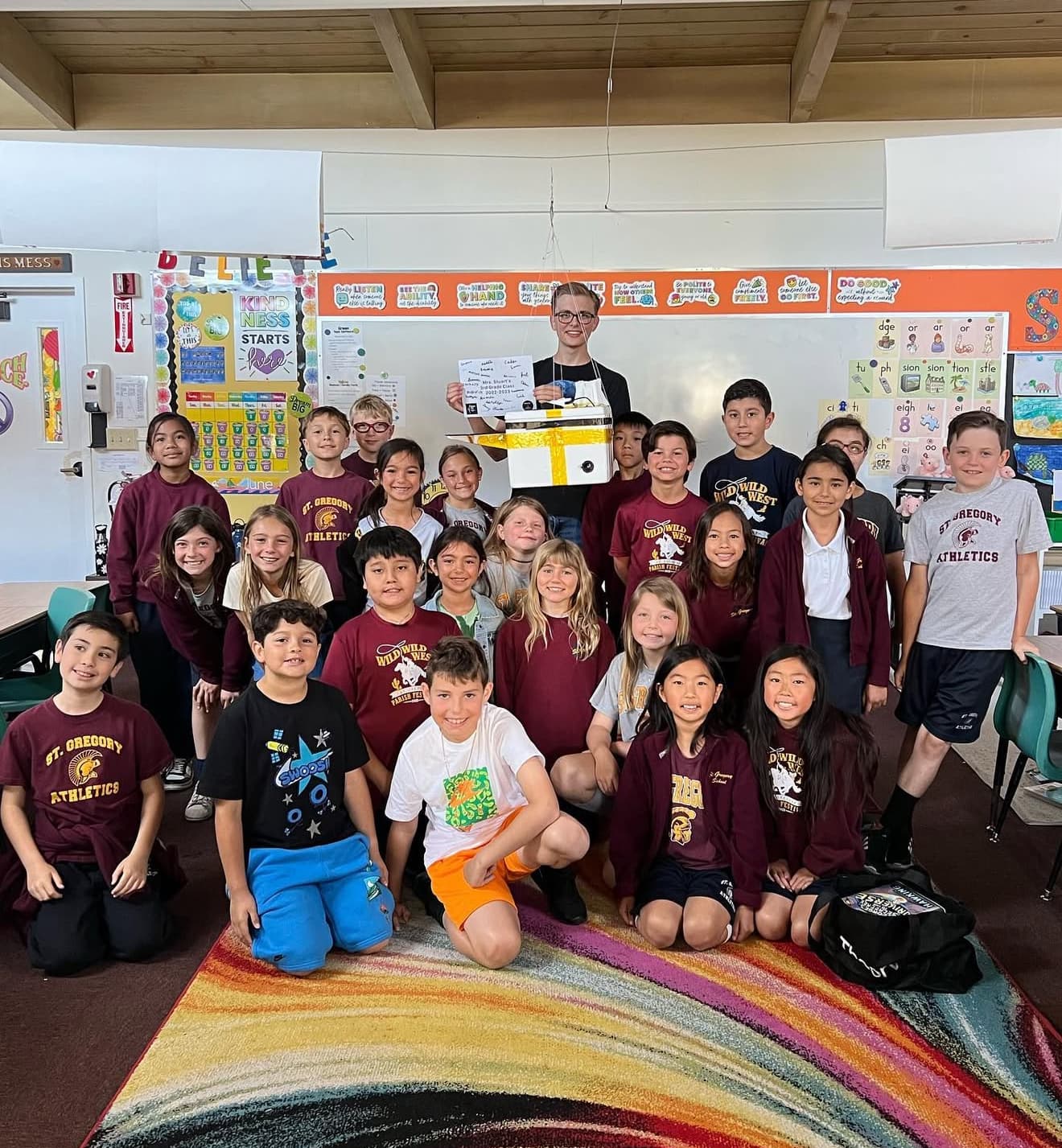 Alexander teaching in front of a classroom